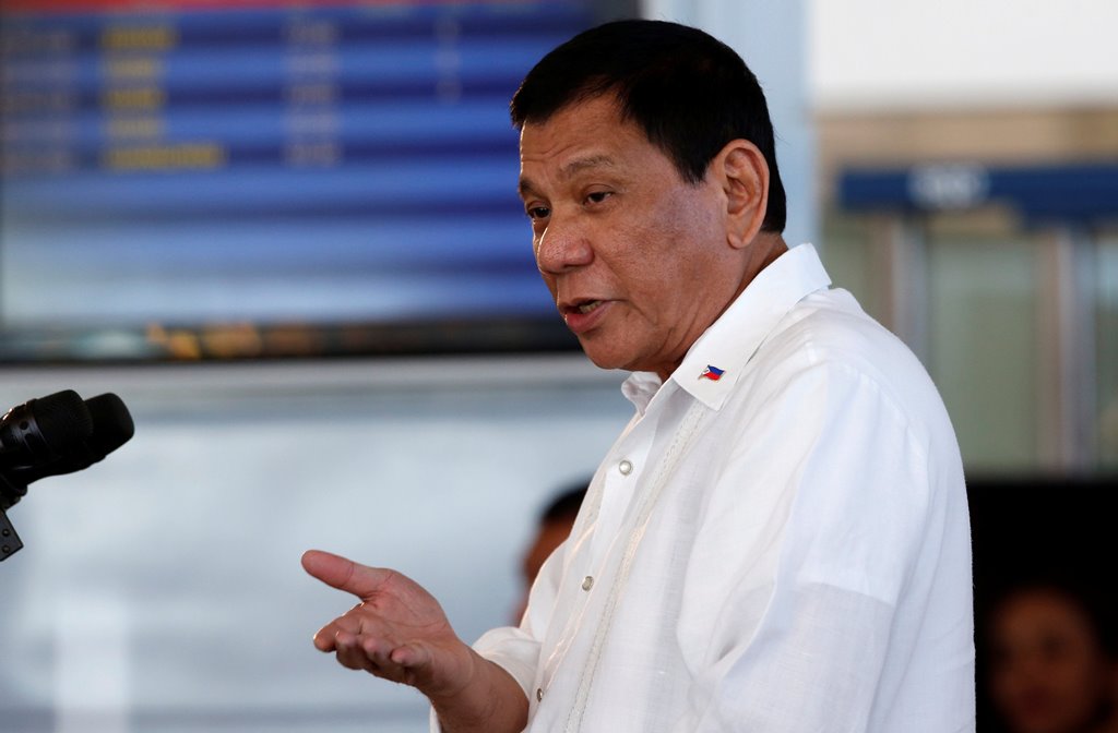 President Rodrigo Duterte speaks during a news conference before his departure for Japan, at the Ninoy Aquino International airport in Paranaque, Metro Manila in the Philippines, October 25, 2016. Reuters/Erik De Castro