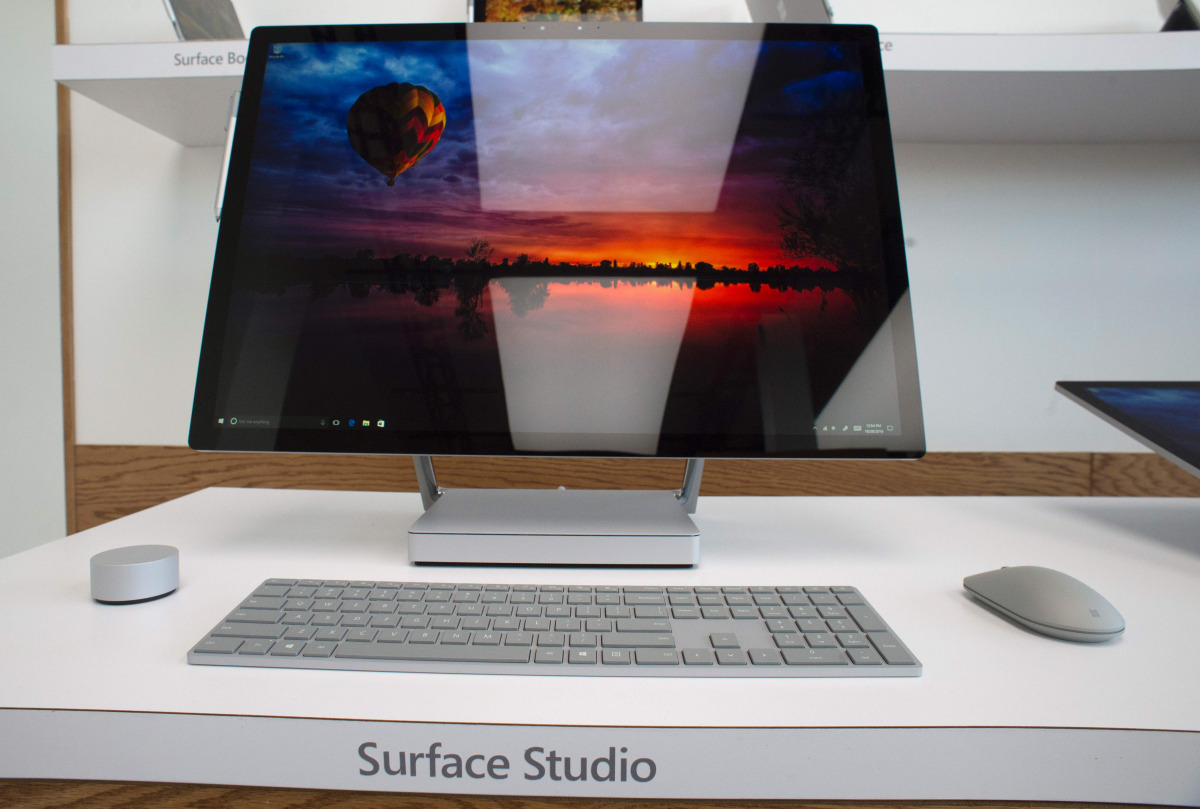 Journalists and Microsoft fans get a look at the new Microsoft Surface Studio introduced at a Microsoft news conference October 26, 2016 in New York. Microsoft launched a new consumer offensive Wednesday, unveiling a high-end computer that challenges the 