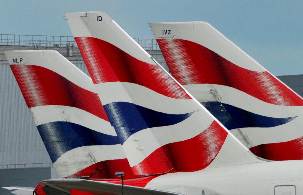 British Airways logos are seen on tailfins at Heathrow Airport in west London, Britain. REUTERS/Toby Melville/Files