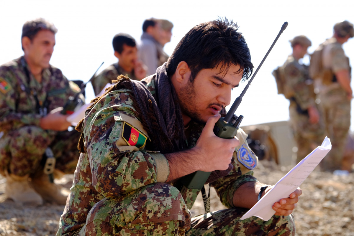 An Afghan Tactical Air Controller practices directing an air strike during an exercise at a range outside Kabul, October 18, 2016. (REUTERS / Josh Smith) 