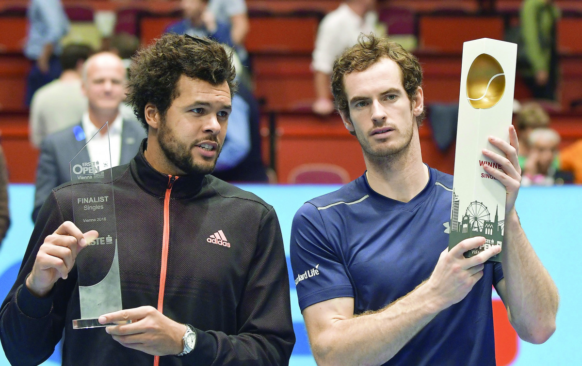 Andy Murray of Great Britain (right) poses after winning the final match against Jo-Wilfried Tsonga of France at the ATP Erste Bank Open Tennis tournament in Vienna, yesterday.