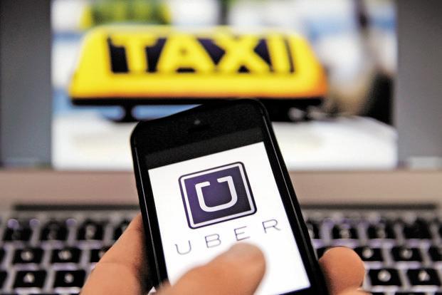 The update is the first major overhaul for the popular application since 2012 and aims to simplify usage for a service that has added new travel options such as uberPool to share rides among several travelers. (Reuters file photo) 