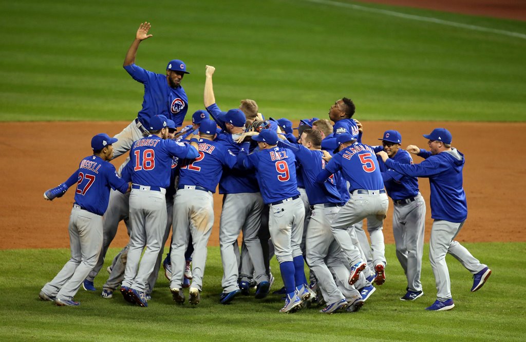 Chicago Cubs players celebrate after defeating the Cleveland Indians in game seven of the 2016 World Series at Progressive Field. Charles LeClaire-USA TODAY Sports 
