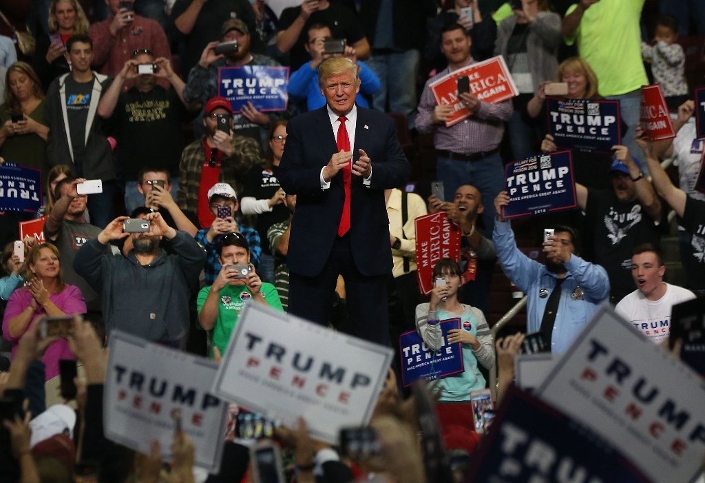 Donald Trump walks onto the stage at a rally on November 4, 2016 in Hershey, Pennsylvania. As both Hillary Clinton and Donald Trump make their final pitches to the American people, recent polls show a tightening race in crucial swing states. Spencer Platt