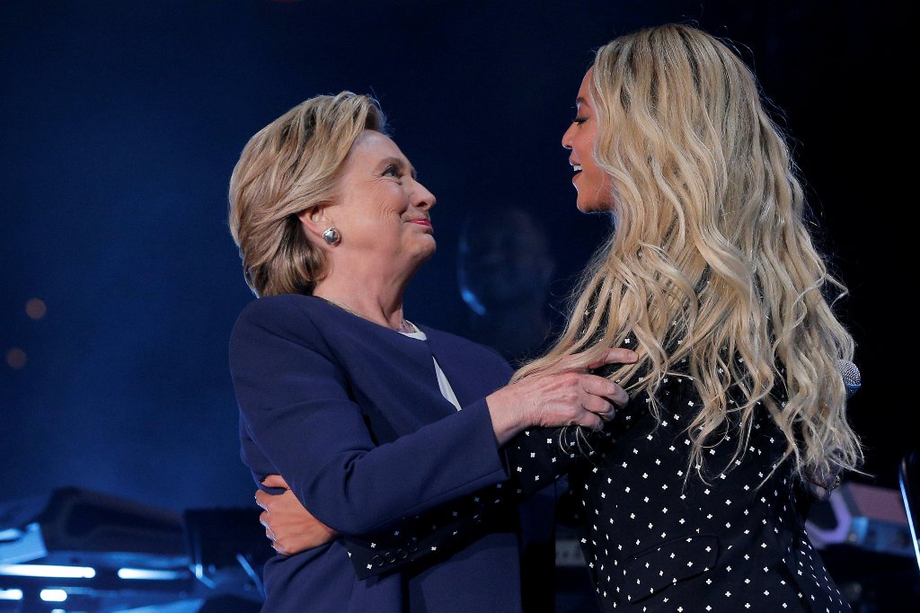 U.S. Democratic presidential nominee Hillary Clinton is joined by artist Beyonce at a campaign concert in Cleveland, Ohio, U.S. November 4, 2016. REUTERS/Brian Snyder TPX IMAGES OF THE DAY
