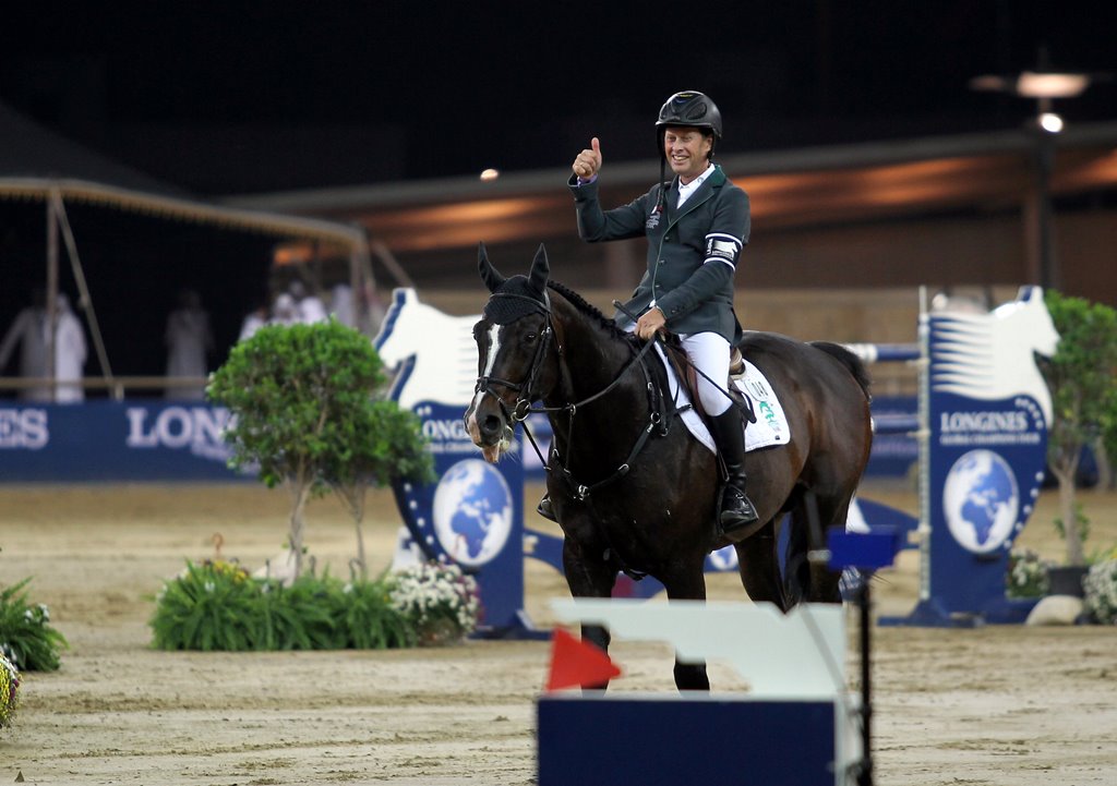 Rolf-Goran Bengtsson of Sweden celebrates after winning Longines Global Champions Tour of Doha, Qatar November 5, 2016. Reuters/Naseem Zeitoon