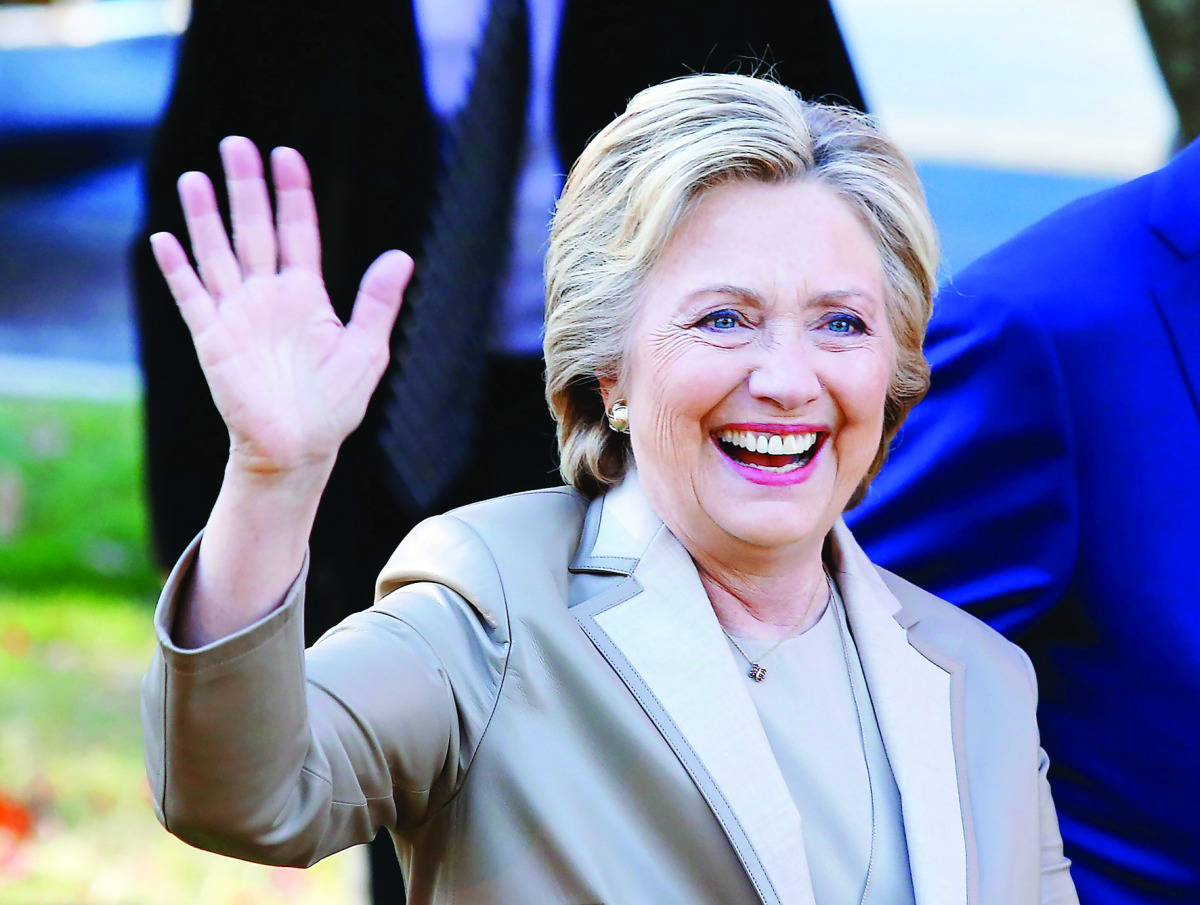 emocratic presidential nominee Hillary Clinton greets supporters after casting her vote in Chappaqua, New York on November 08, 2016. Chanting 