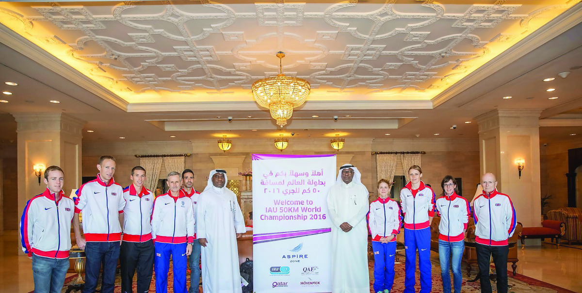 Abdullah Al Khater, Manager of Events at Aspire Zone Foundation poses for a photo with the British delegation which arrived in Doha yesterday to take part in the IAU 50km World Championship. The Championship will be held on Friday.