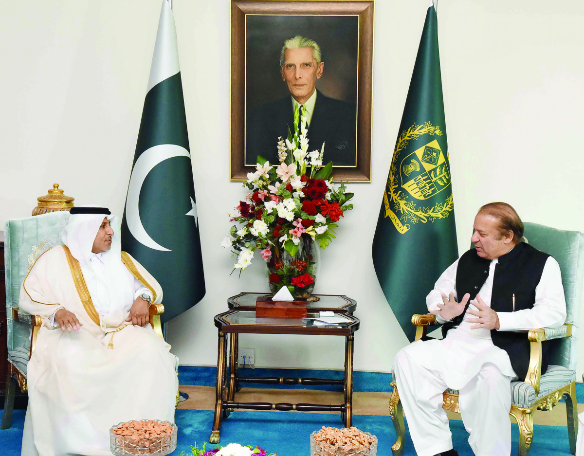 Sheikh Ali bin Abdullah Al-Thani, Chairman of Pak-Qatar Takaful Group (left), with Pakistan Prime Minister Muhammad Nawaz Sharif at the PM's office in Islamabad. 