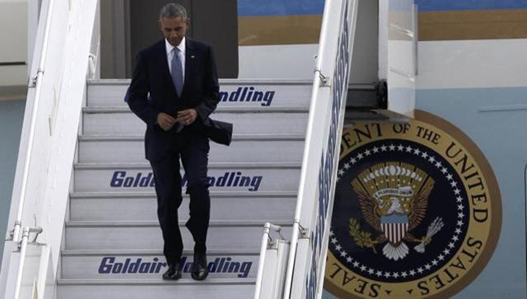 US President Barack Obama arrives aboard Air Force One at the Eleftherios Venizelos International airport in Athens on Tuesday. (Reuters)