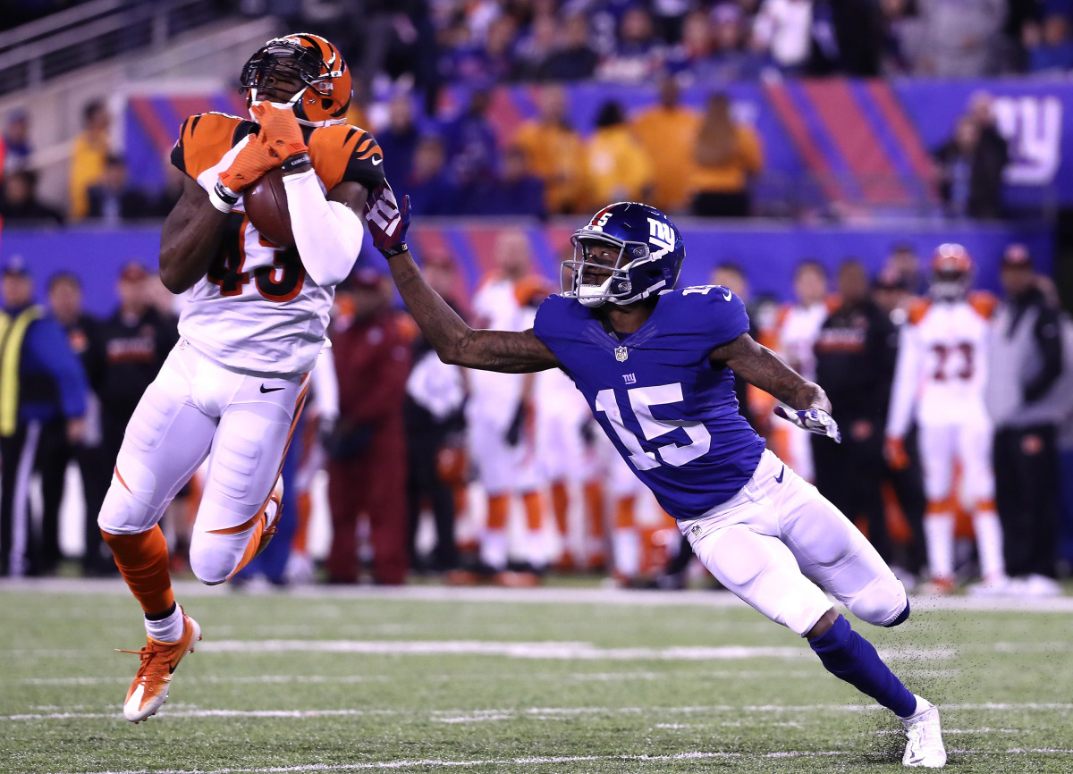 George Iloka #43 of the Cincinnati Bengals intercepts a ball intended for Tavarres King #15 of the New York Giants during the fourth quarter of the game at MetLife Stadium on November 14, 2016 in East Rutherford, New Jersey. New York Giants quarterback El