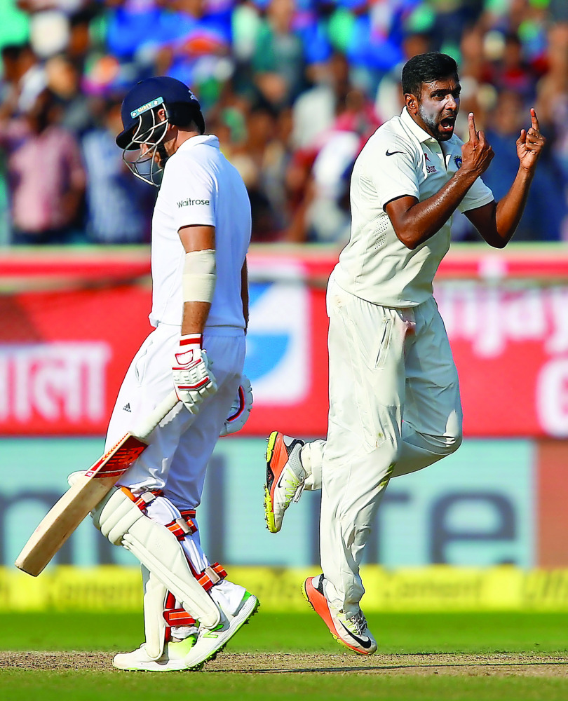 India's Ravichandran Ashwin (right) celebrates the dismissal of England's Joe Root during their second Test cricket match at Dr. YS Rajasekhara Reddy ACA-VDCA Cricket Stadium in Visakhapatnam, India yesterday.