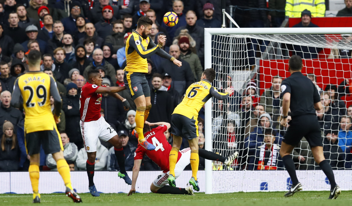 Olivier Giroud scores their first goal. (Reuters / Jason Cairnduff)