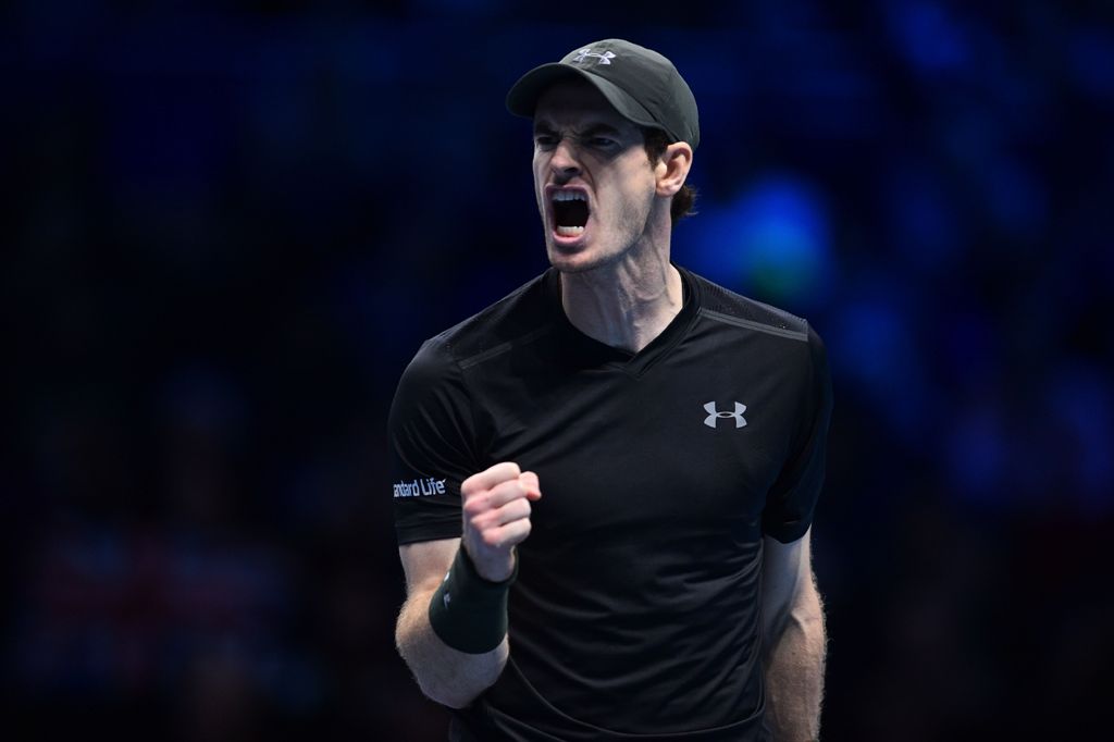 Britain's Andy Murray reacts after winning a point against Canada's Milos Raonic in the second set during their men's semi-final singles match on day seven of the ATP World Tour Finals tennis tournament in London on November 19, 2016. / AFP / Glyn KIRK
