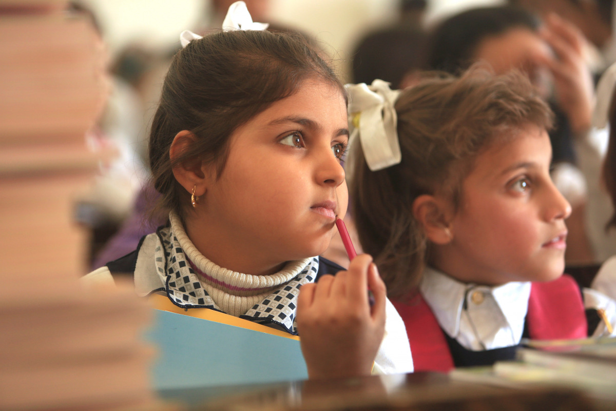 Students attend classes after the city was recaptured from the Islamic State militants in Qayyara, Iraq, November 17, 2016. REUTERS/Ari Jalal