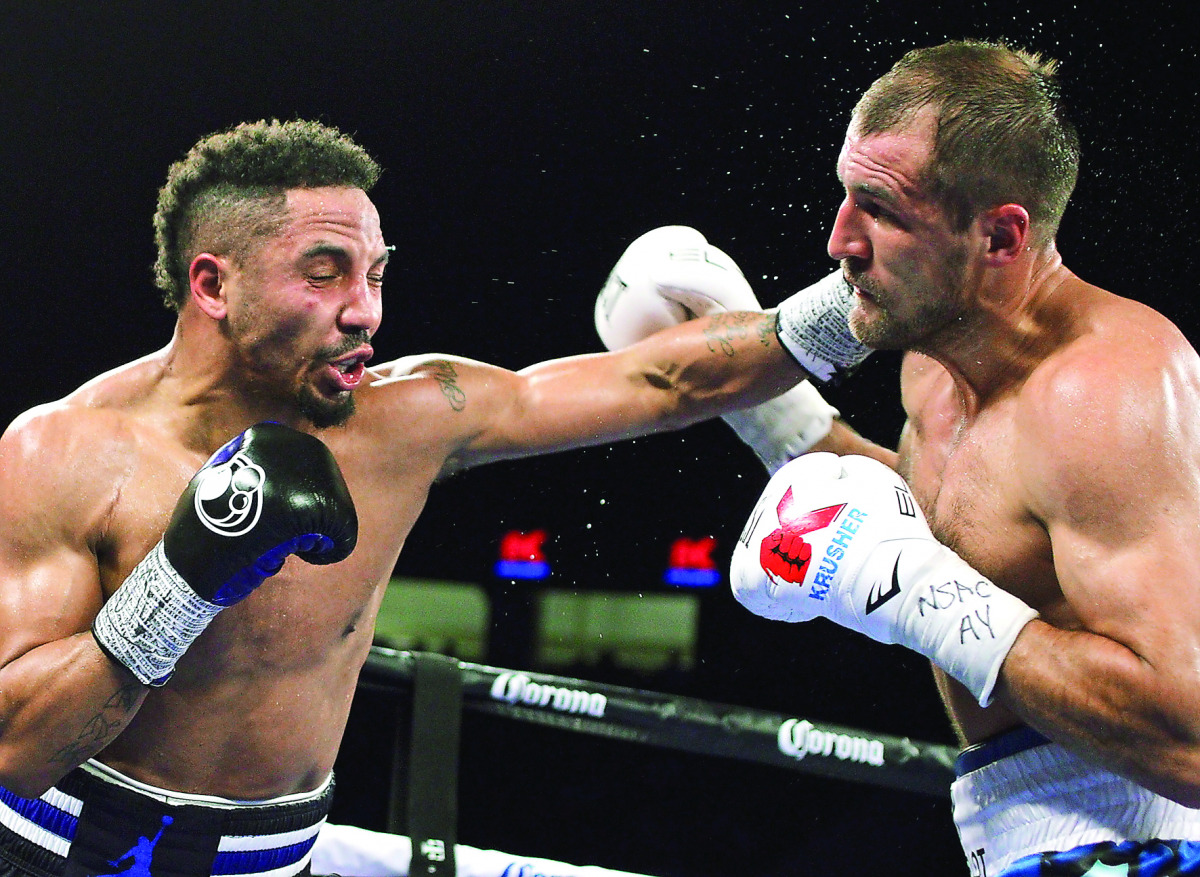 Andre Ward of the US (left) throws a left at Sergey Kovalev of Russia during their WBA, IBF and WBO light heavyweight world championship fight in Las Vegas, US on Saturday.