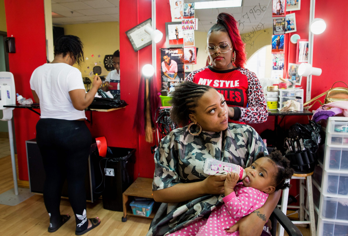 Derricka Welsey gets her hair done on North Avenue in Milwaukee on November 17,2016, one week after President-elect Donald Trump and Vice President Mike Pence won the state of Wisconsin, a state that in the past has been democrat state, and went republica