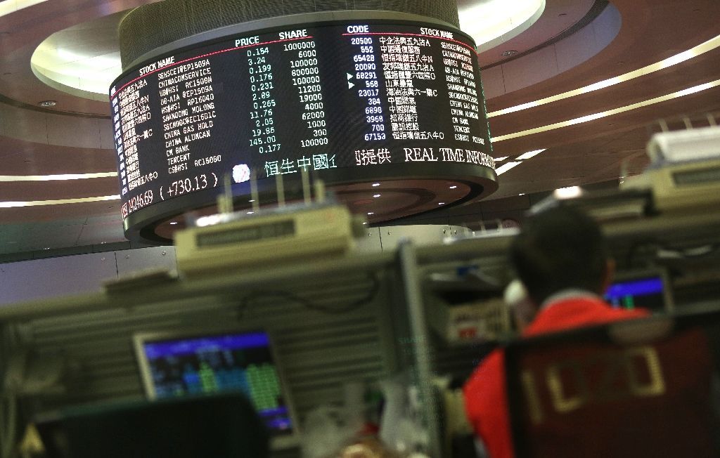 Stocks in Asia are up after a strong lead from Wall Street, where traders are betting on a possible US interest rate hike next month (AFP Photo/Isaac Lawrence)
