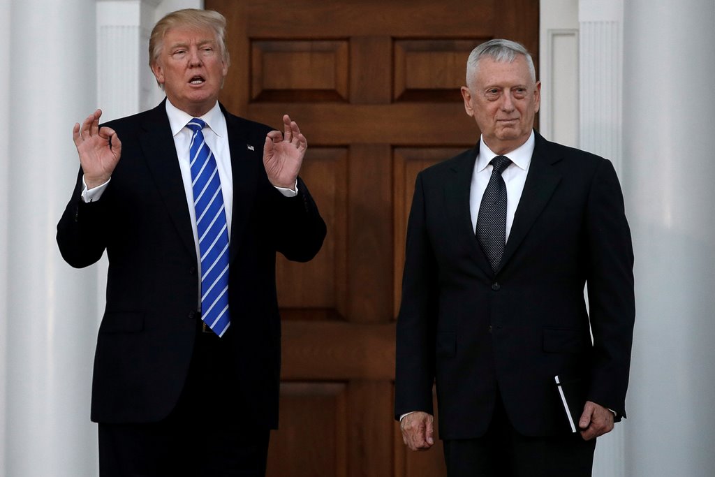 US President-elect Donald Trump stands with retired Marine Gen. James Mattis following their meeting at the main clubhouse at Trump National Golf Club in Bedminster, New Jersey, US, November 19, 2016. Reuters/Mike Segar/File Photo