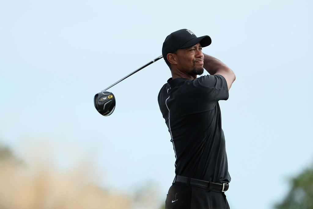 Tiger Woods of the United States hits his tee shot on the 13th hole during round one of the Hero World Challenge at Albany, The Bahamas on December 1, 2016 in Nassau, Bahamas. Christian Petersen/Getty Images/AFP
