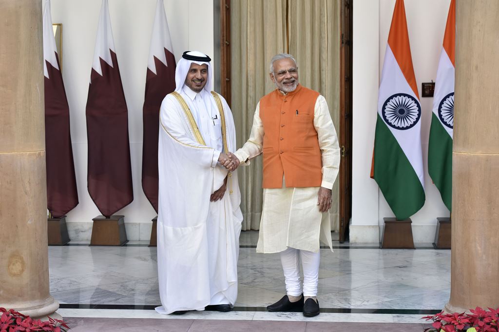 India's Prime Minister Narendra Modi (R) shakes hands with Qatar's Prime Minister HE Abdullah bin Nasser bin Khalifa Al Thani prior to a meeting in New Delhi on December 3, 2016. AFP 

