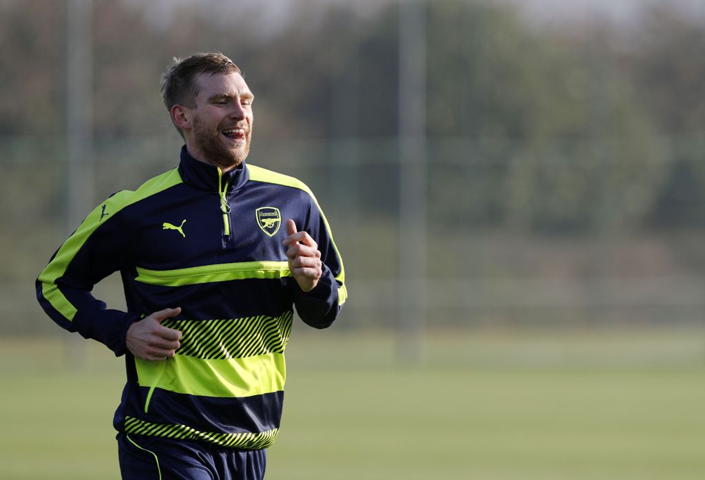 Arsenal's German defender Per Mertesacker runs during a training session at the club's complex in London Colney on December 5, 2016. AFP / ADRIAN DENNIS