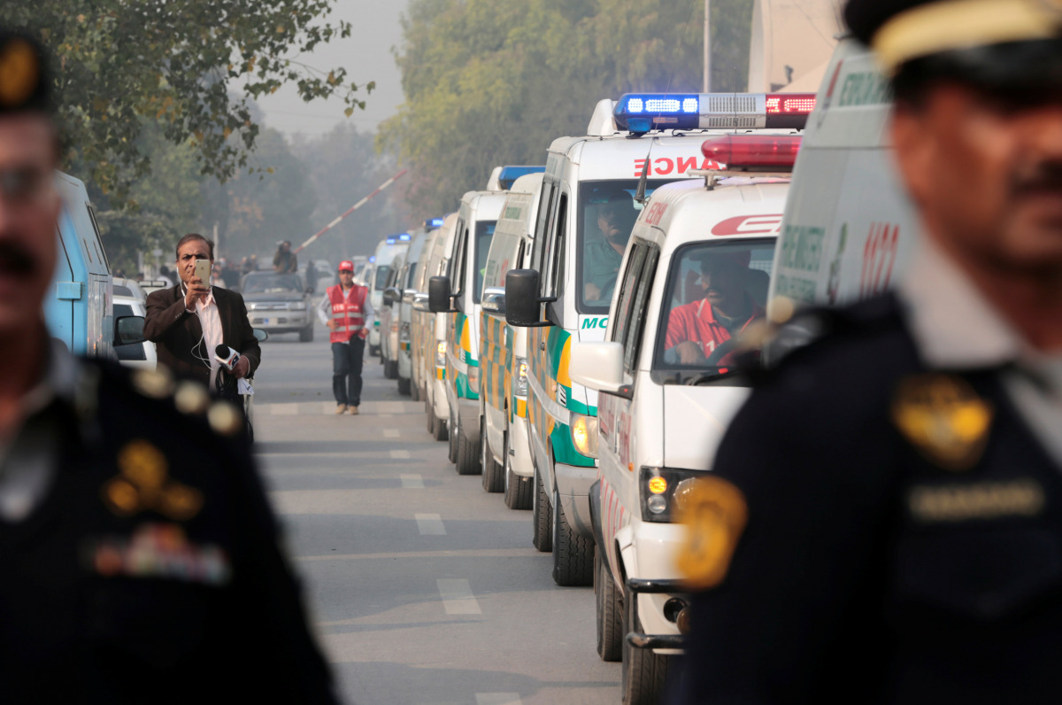 Coffins containing the remains of victims of the Pakistan International Airlines (PIA) plane crash arrive at PIMS hospital by ambulance in Islamabad, Pakistan December 8, 2016. REUTERS/Caren Firouz