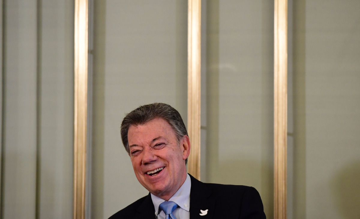 Nobel Peace Prize laureate Colombian President Juan Manuel Santos smiles as he addresses a press conference in Oslo on December 9, 2016. Santos said the Nobel Peace Prize was a 