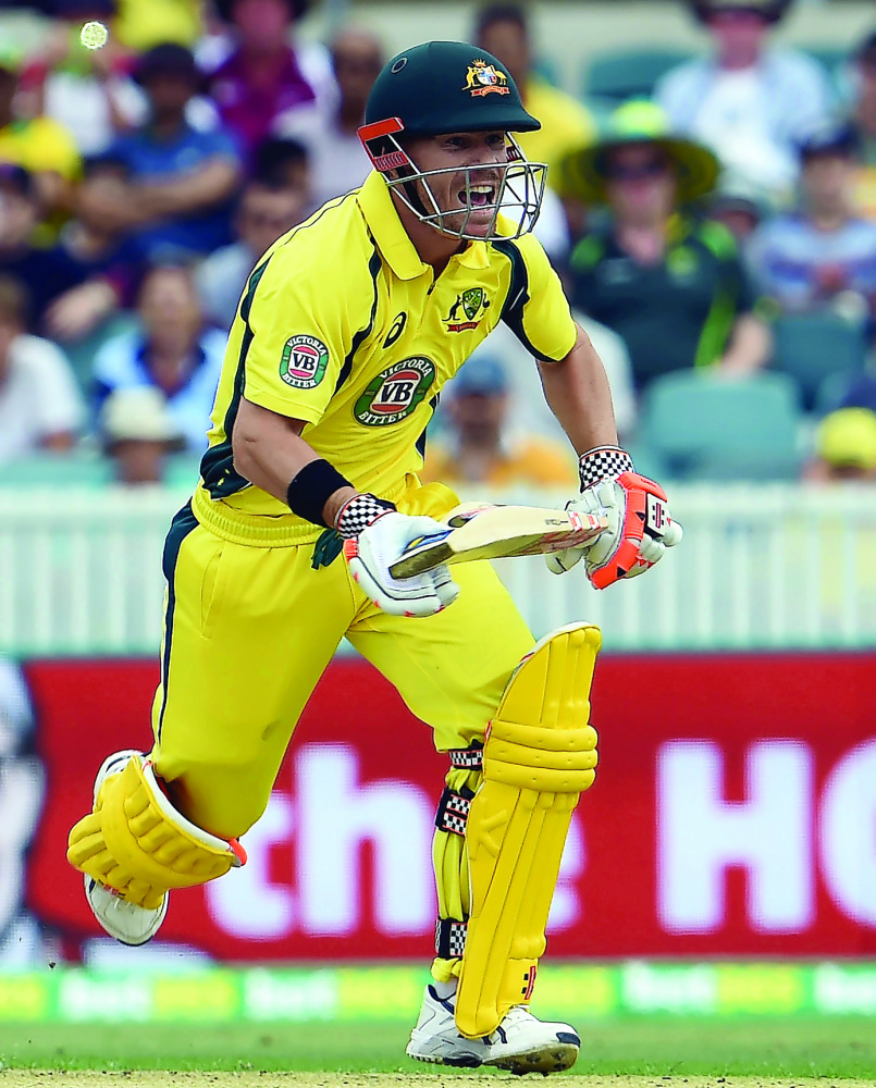 Australia's batsman David Warner shouts in jubilation as they beat New Zealand during their second game of the One Day International Cricket series in Melbourne, Australia yesterday.