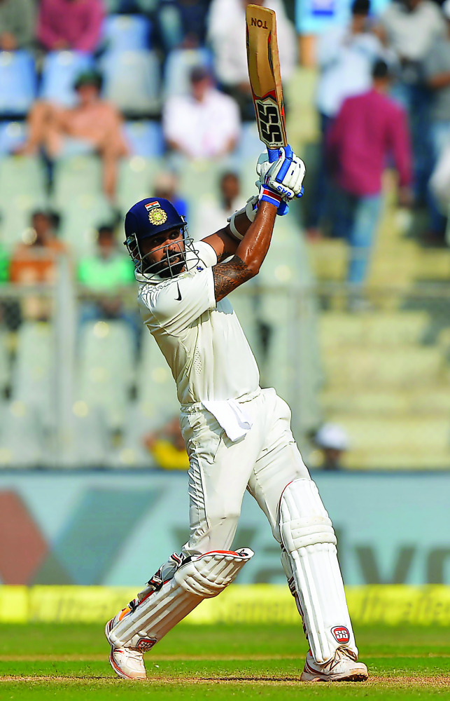 India's Murali Vijay plays a shot on the second day of the fourth Test cricket match against England at the Wankhede stadium in Mumbai, India, yesterday.
