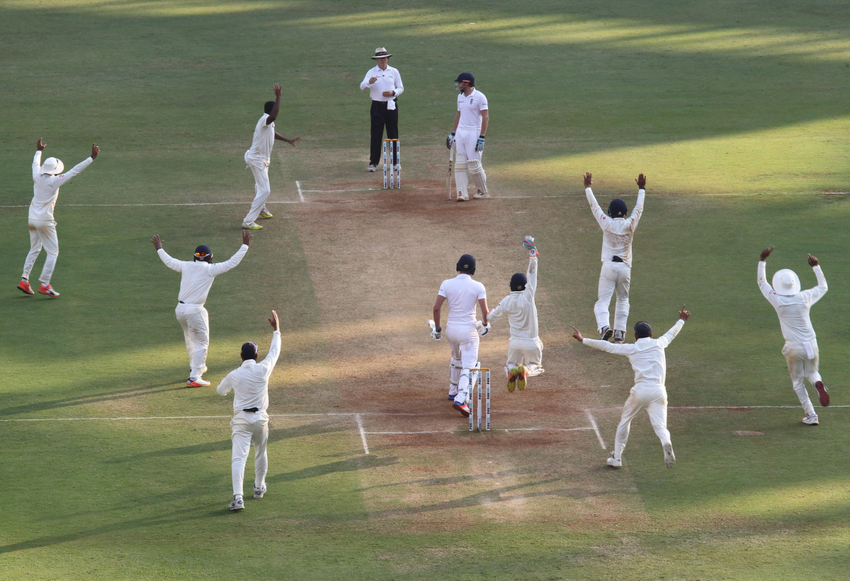 India's players celebrate the wicket of England's Jake Ball. (Reuters/Danish Siddiqui)