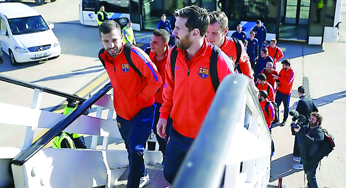 Barcelona players board the flight as they prepare to leave for Doha to play against Al Ahli Saudi FC in the Match of the Champions at the Thani Bin Jassim Stadium, starting at 7.00pm today. Picture courtesy www.fcbarcelona.com