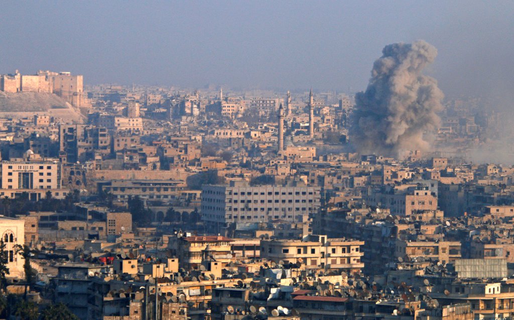 Smoke rises as seen from a government-held area of Aleppo, Syria December 12, 2016. REUTERS/Omar Sanadiki