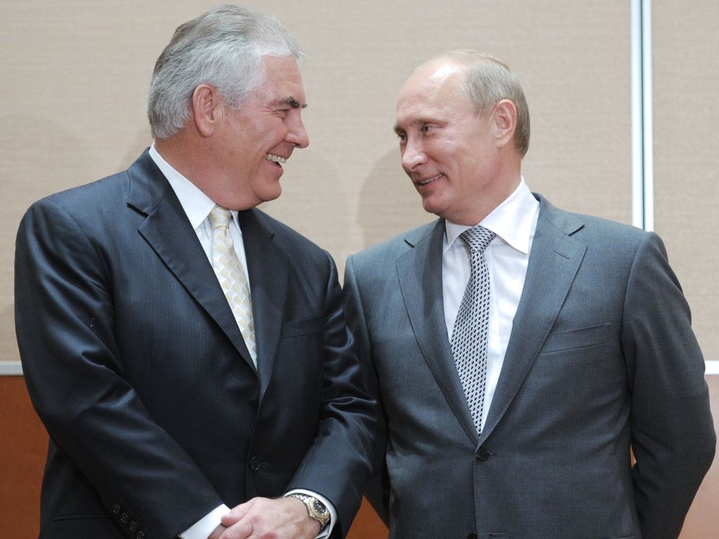 (FILES) This file photo taken on August 30, 2011 shows Russia's Prime Minister Vladimir Putin (L) speaking with ExxonMobil President and Chief Executive Officer Rex Tillerson during the signing of a Rosneft-ExxonMobil strategic partnership agreement in So