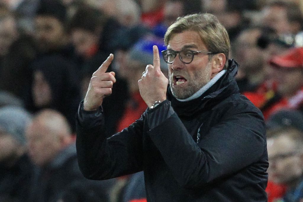Liverpool's German manager Jurgen Klopp gestures from the touchline during the English Premier League football match between Liverpool and West Ham United at Anfield in Liverpool, north west England on December 11, 2016.  AFP / Lindsey PARNABY