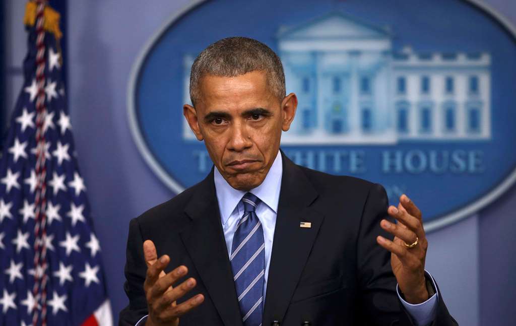 US President Barack Obama participates in his last news conference of the year at the White House before leaving for his annual Hawaiian Christmas holiday in Washington, US. Reuters/Carlos Barria
