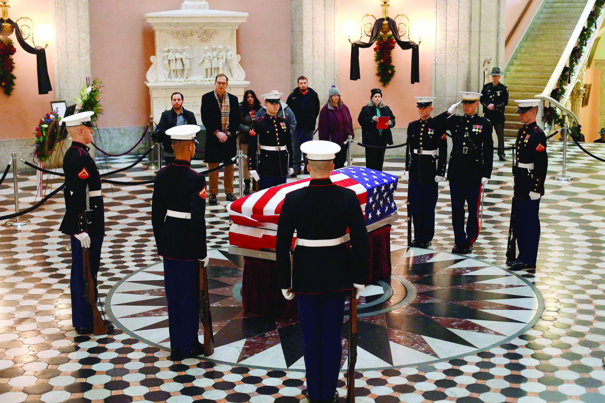 United States Marines stand guard as they surround the casket of former Astronaut and US Senator John Glenn, as he lays in state at the Ohio Statehouse, yesterday.