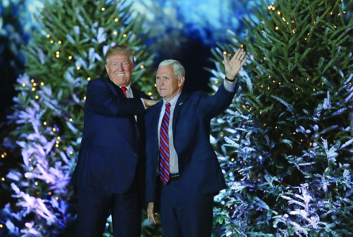 US President-elect Donald Trump and Vice President-elect Mike Pence appear together during a stop on his “USA Thank You Tour 2016” at the Orlando Amphitheater at the Central Florida Fairgrounds in Orlando, yesterday.