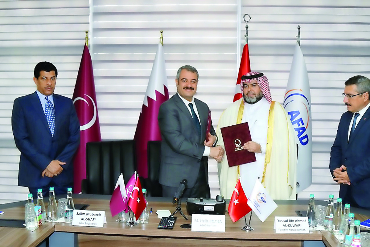 Officials during the signing ceremony.
