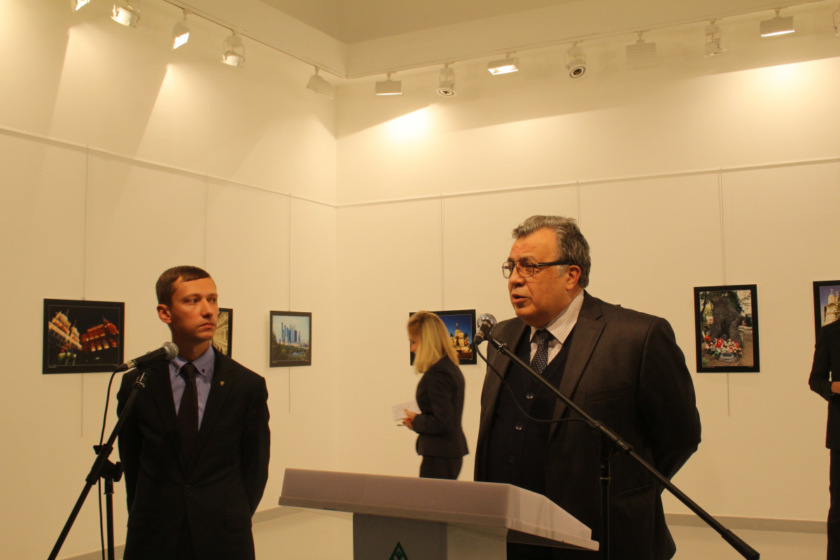 Russian Ambassador to Turkey, Andrei Karlov (R) gives a speech as he visits an art fair at Modern Art Center in Ankara, Turkey on December 19, 2016. Karlov has been shot multiple times at an exhibition in Ankara on Monday evening. (Ecenur Çolak - Anadolu 