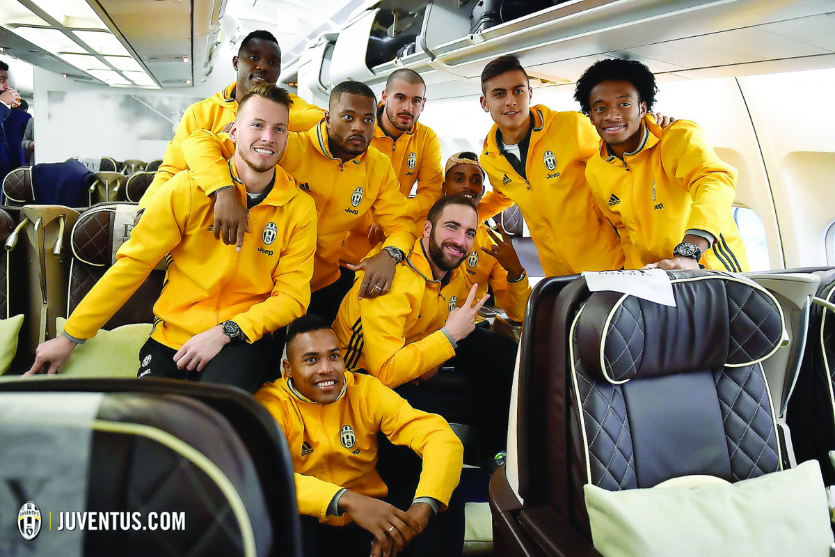 Juventus' players pose for a photograph,  prior to their departure to Doha. The defending champions Juventus, play in the Italiana Supercoppa final against AC Milan in Doha on Friday. Twitter/JuventusFC
