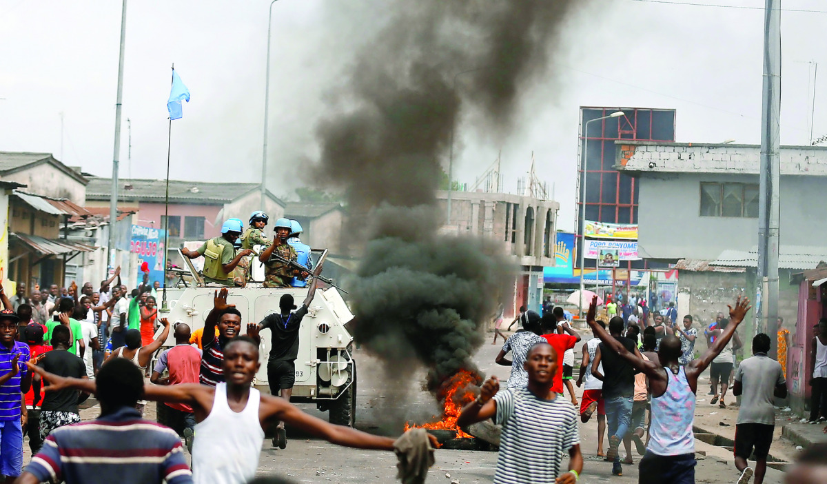Peacekeepers serving in the United Nations Organization Stabilization Mission in the Democratic Republic of Congo (MONUSCO) patrol during demonstrations against Congolese President Joseph Kabila in Kinshasa, yesterday. 