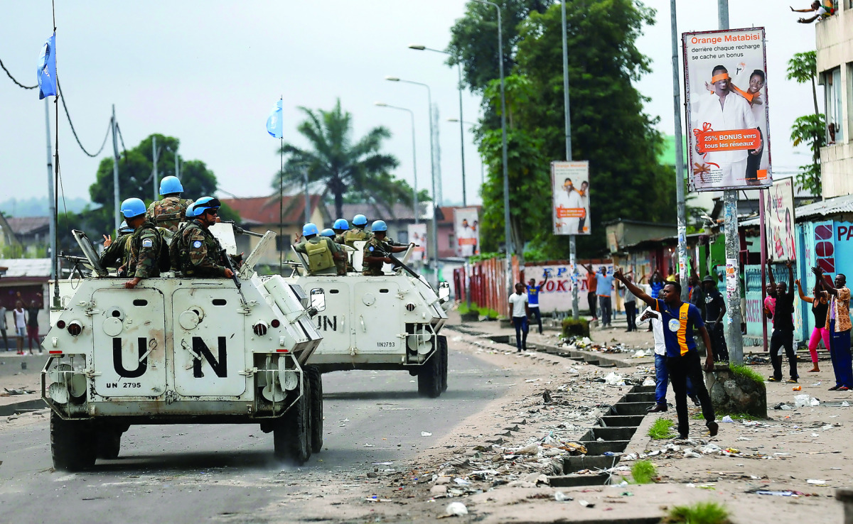 Peacekeepers serving in the United Nations Organization Stabilization Mission in the Democratic Republic of Congo (MONUSCO) patrol during demonstrations against Congolese President Joseph Kabila in Kinshasa, yesterday.