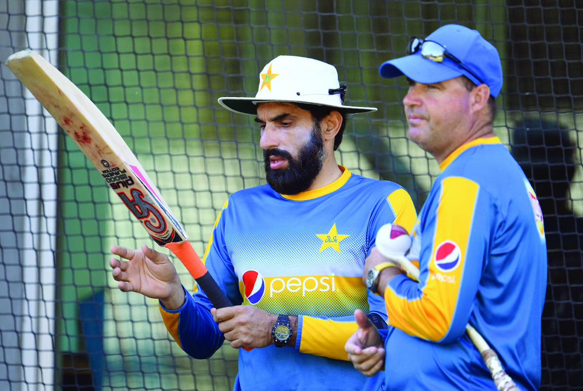 Pakistan cricket captain Misbah-ul-Haq (left) chats with coach Mickey Arthur during a practice session in Melbourne yesterday, ahead of their Boxing Day Test match against Australia.