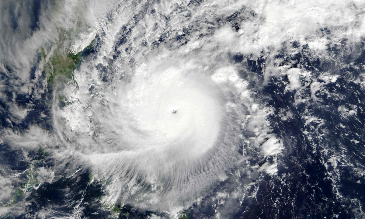 This December 25, 2016 NASA satellite images shows Super Typhoon Nock-ten (30W) over the Philippines. A powerful typhoon with gusts of up to 235 kilometres (146 miles) an hour hit the Philippines late Sunday, disrupting Christmas celebrations for tens of 