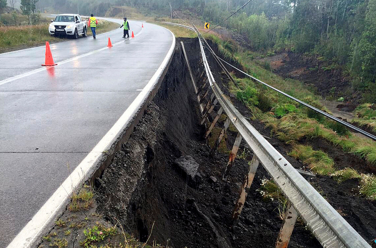 A damaged road is seen after a quake hit Chiloe island, southern Chile, December 25, 2016. REUTERS