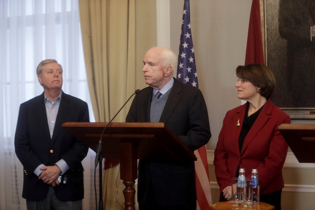 U.S. Senators Lindsey Graham, John McCain, and Amy Klobuchar (L-R) attend a news conference in Riga, Latvia December 28, 2016. Picture taken December 28, 2016. REUTERS/Ints Kalnins
