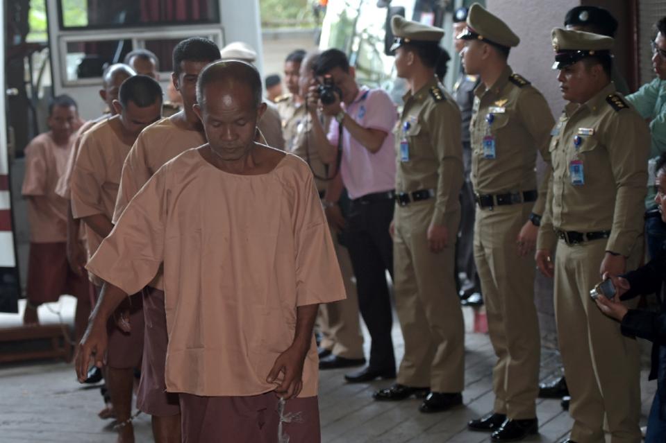 Suspects facing human trafficking charges arrive at the criminal court in Bangkok on November 10, 2015 (AFP / Pornchai Kittiwongsakul) 