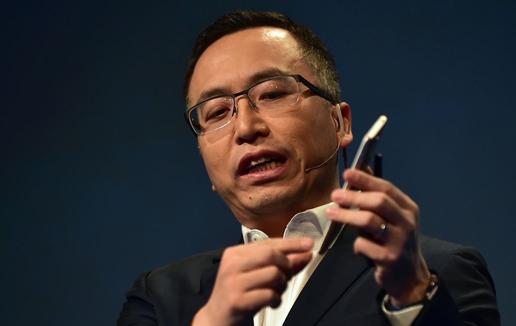 George Zhao, president of Honor, a division of Huawei, speaks while holding the newly introduced Honor 6X phone during the company's press conference at the 2017 Consumer Electronics Show (CES2017) in Las Vegas, Nevada, on January 3, 2017. AFP / Frederic 