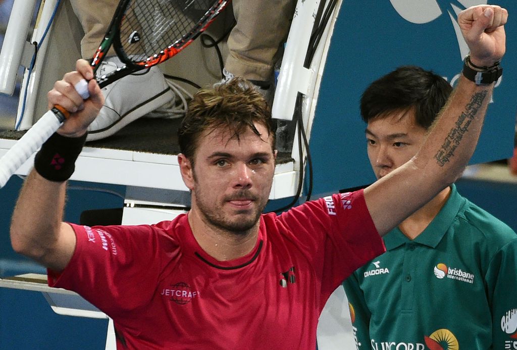 Stan Wawrinka of Switzerland celebrates his victory against Viktor Troicki of Serbia in the men's second round at the Brisbane International tennis tournament in Brisbane on January 4, 2017.  AFP / SAEED KHAN